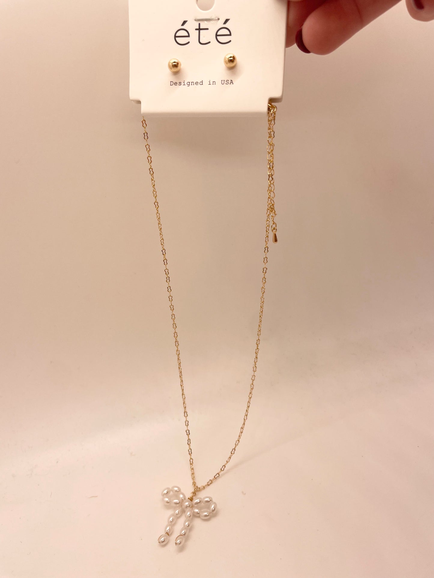 Pearl Bow Necklace with Gold Studs